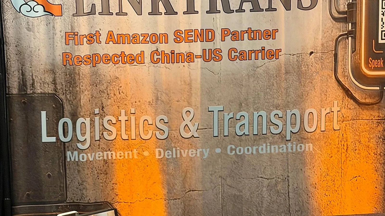 Linktrans branded booth backdrop at the Nashville summit